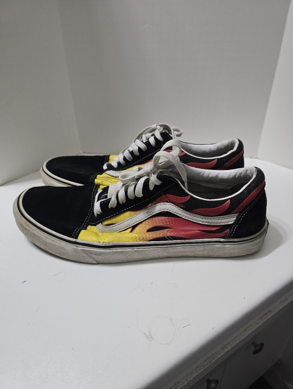 Vans Old Skool Sneakers with Yellow and Red Flame Graphics